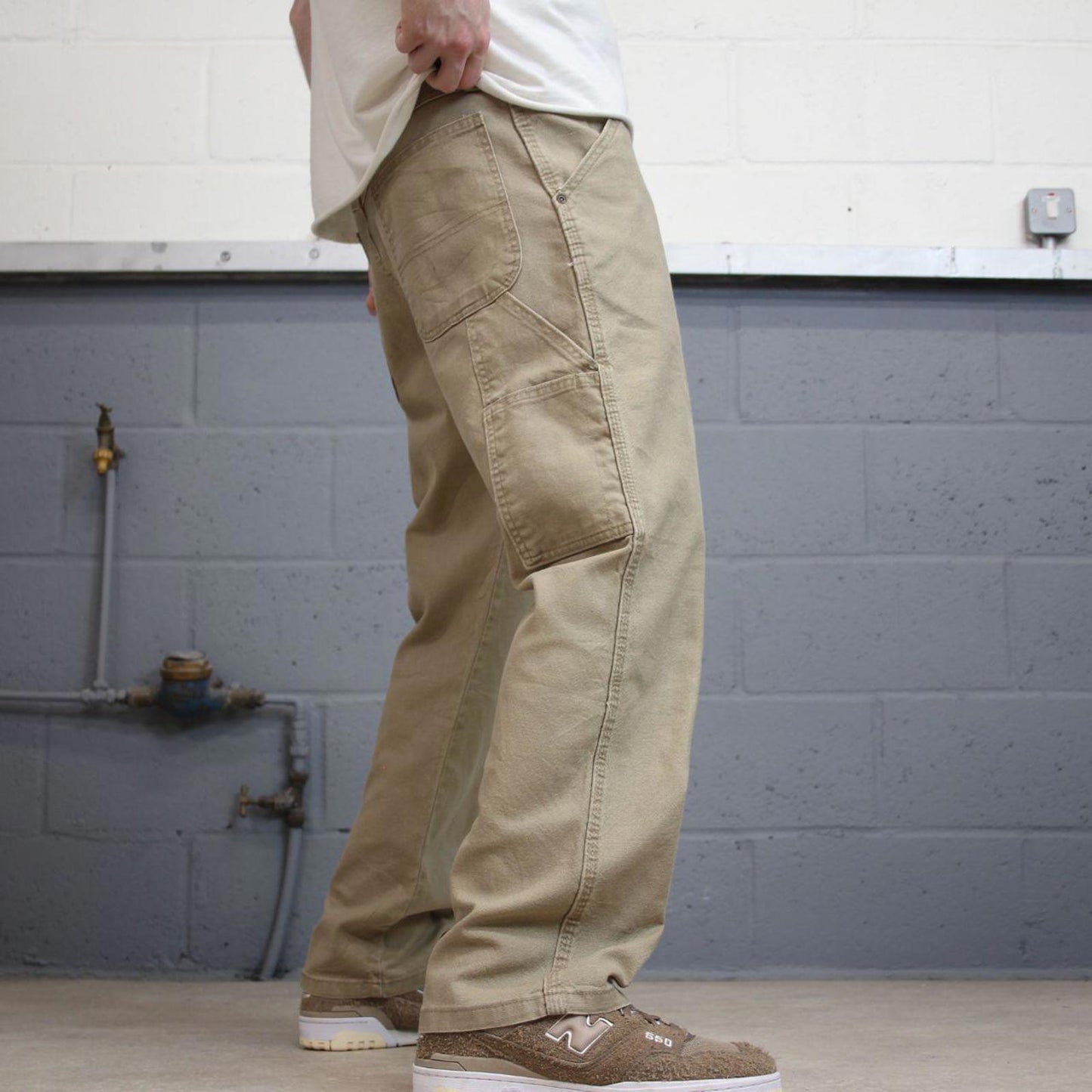 Tan Wrangler carpenter jeans W34L30 loose cargo skater style jeans