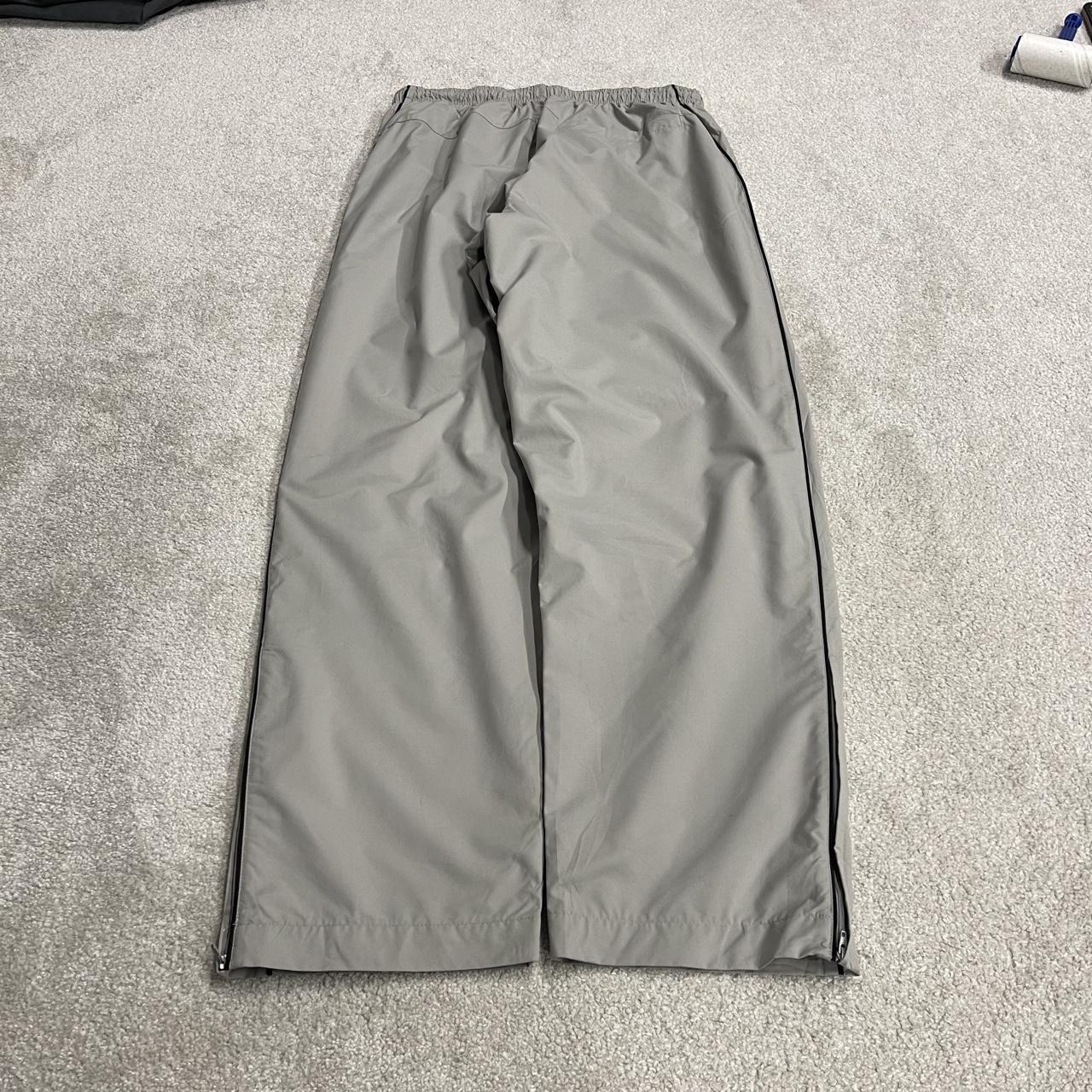 Vintage Nike baggy tracksuit bottoms Y2K grey Wide leg lined embroidered side stripe track pants