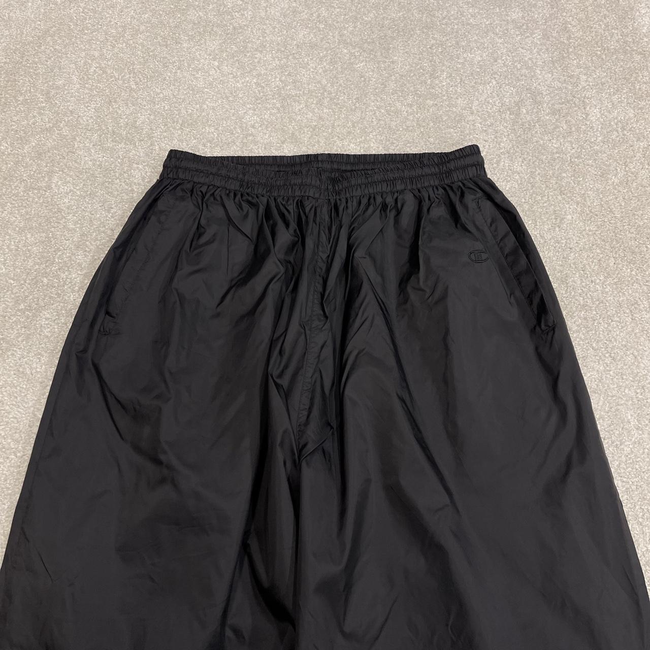 Champion baggy tracksuit bottoms black embroidered Loose mesh lined casual track pants