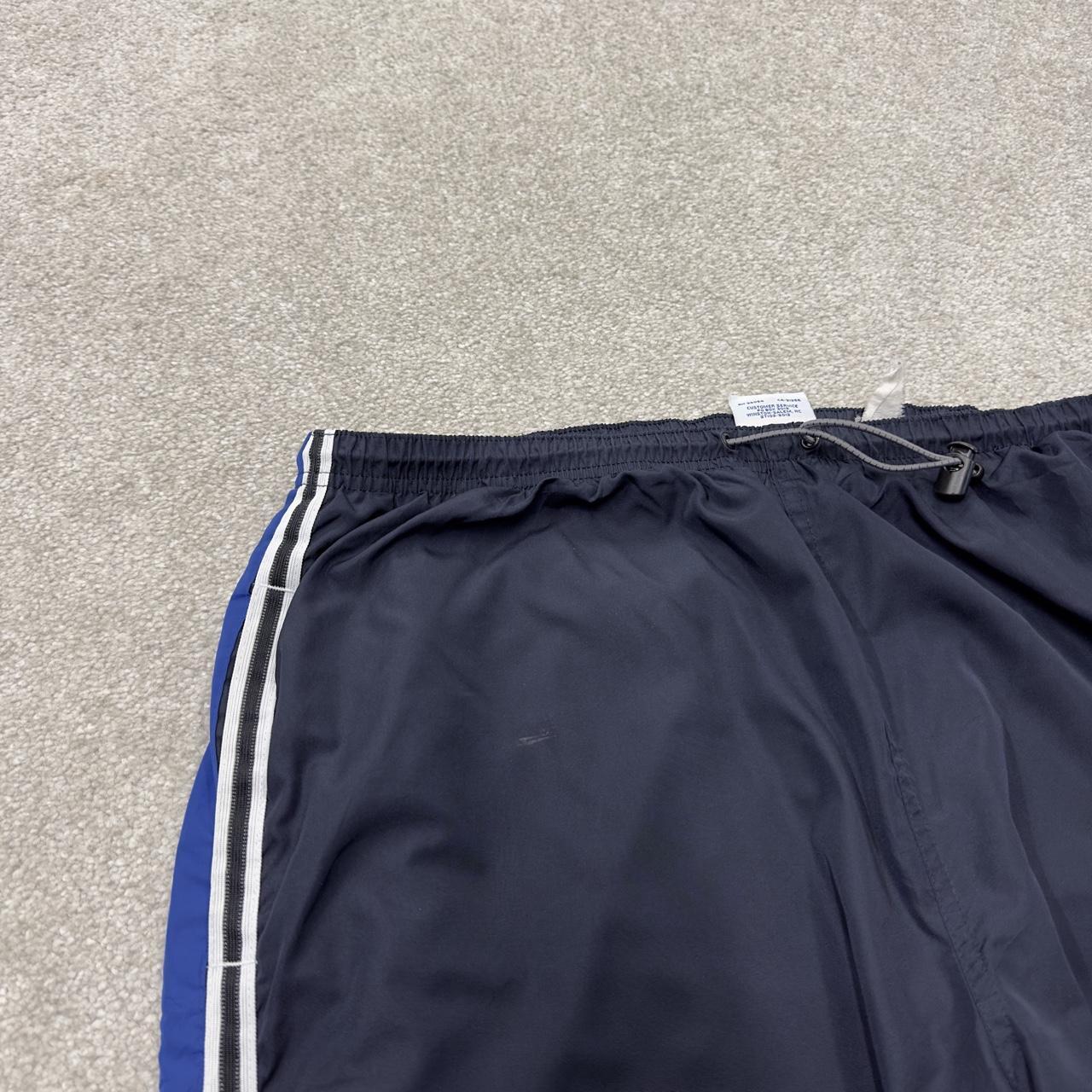 Baggy Y2K Champion tracksuit bottoms navy Loose leg lined 2000s style casual track pants