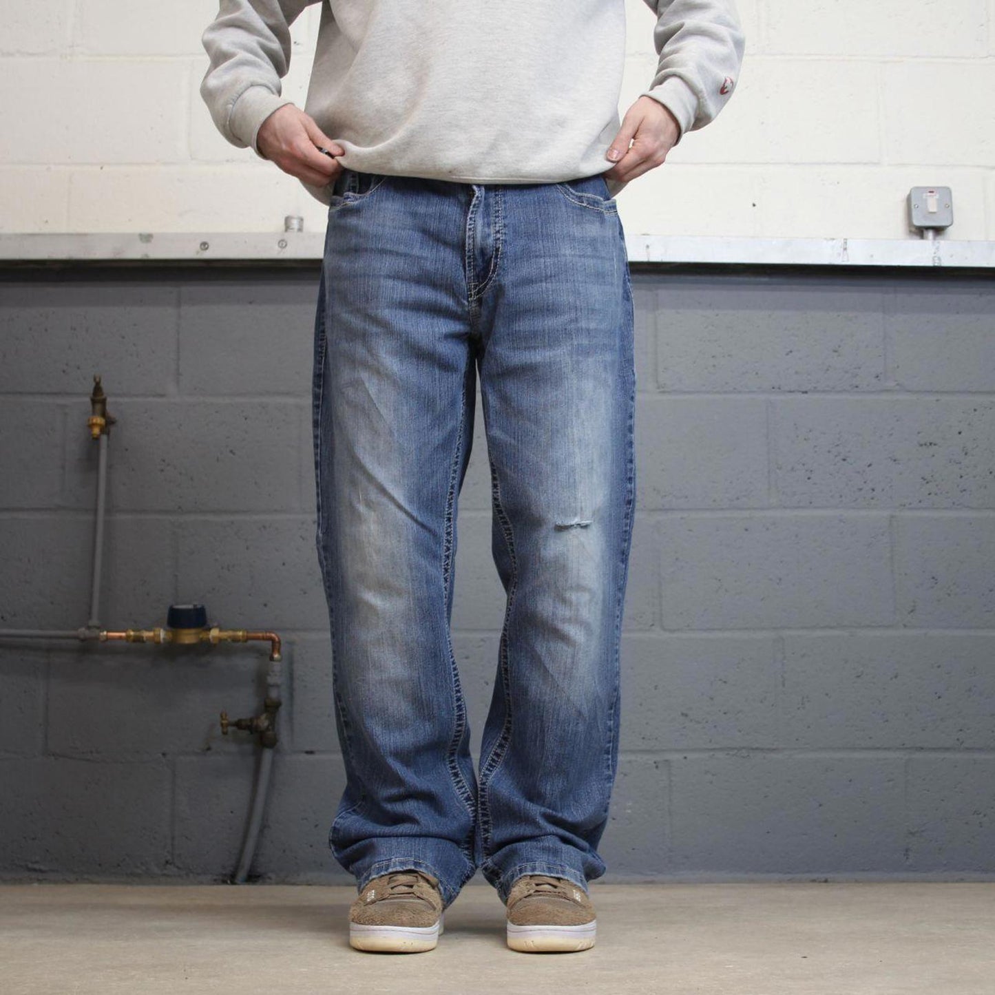 Y2k embroidered Axel bootcut jeans W38L32 blue denim stitched 00s skate style pants