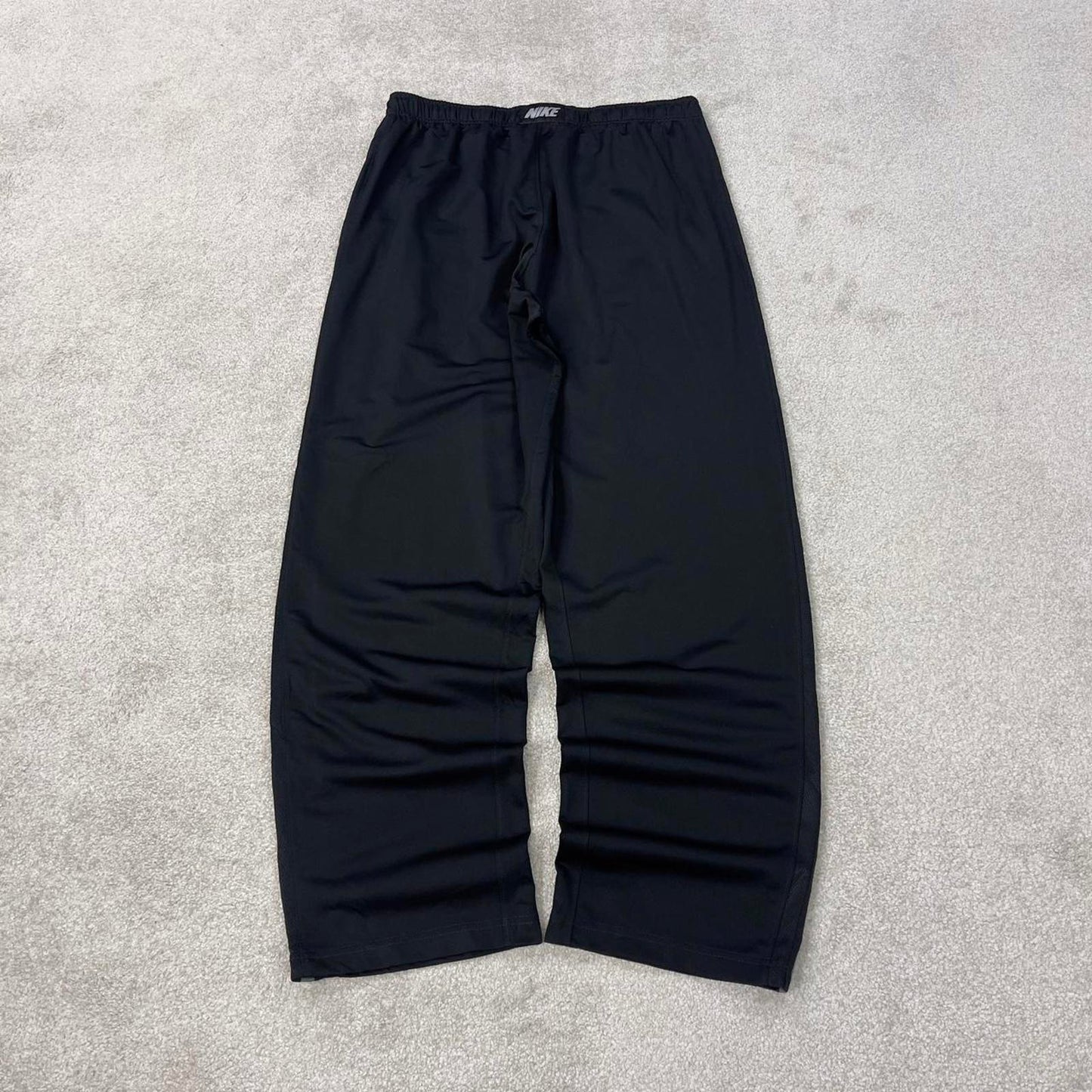 Baggy Nike Trackies Large Black y2k 00s style loose wide leg joggers embroidered logo side stripe