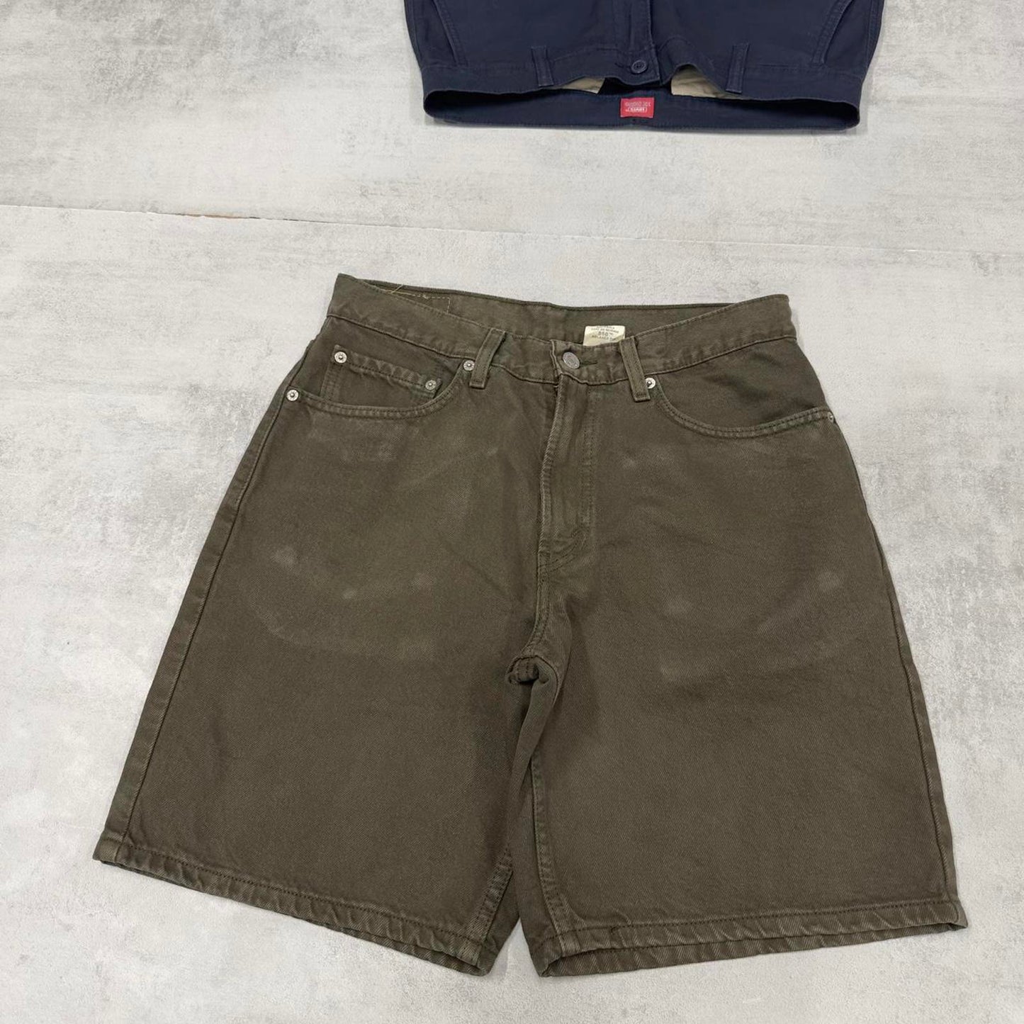 Vintage Levi's 550 denim jean shorts W31 green denim 90s style jorts red tab logo