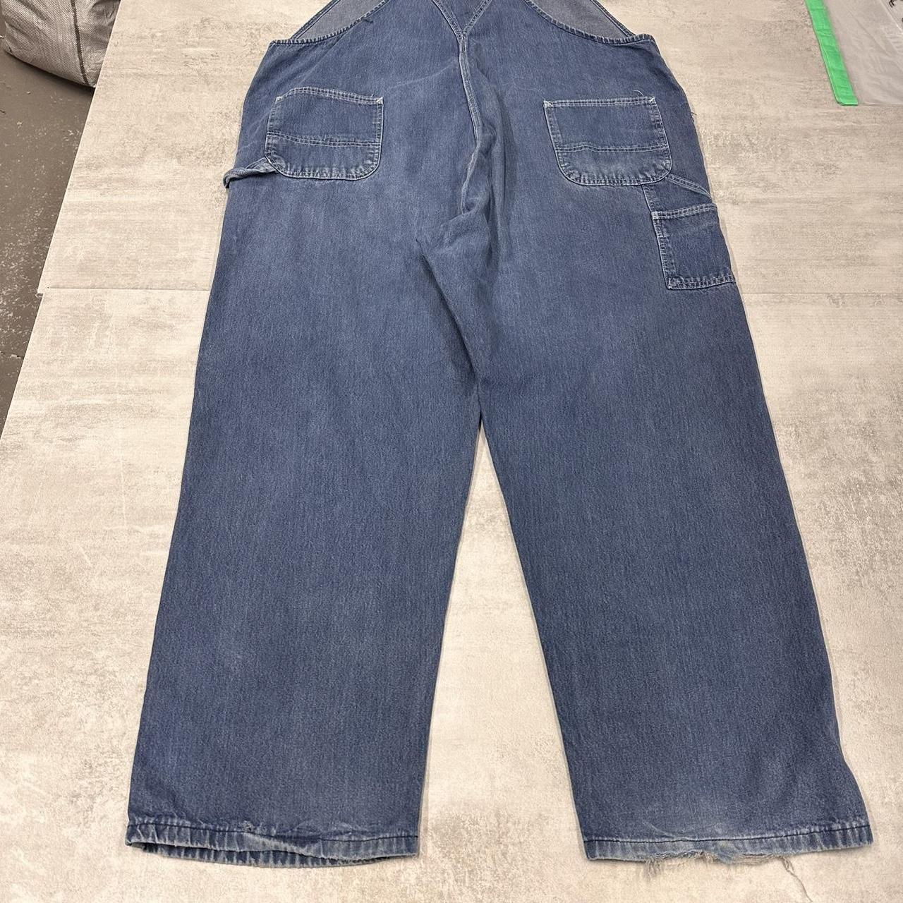 Blue denim Carhartt overalls W54