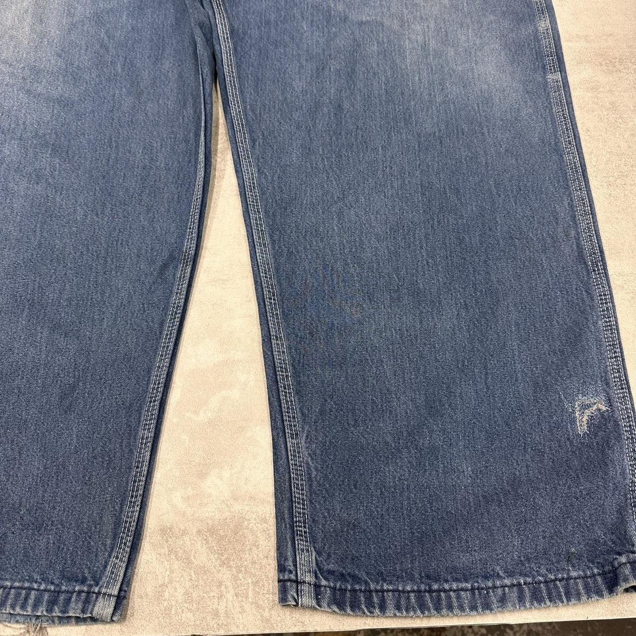 Blue denim Carhartt overalls W54