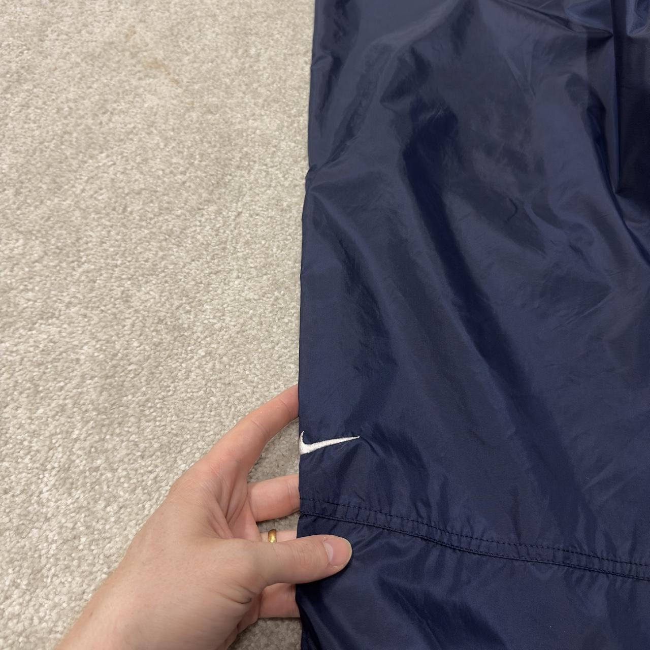 Vintage Nike tracksuit bottoms Y2K navy Loose leg unlined embroidered swoosh track pants