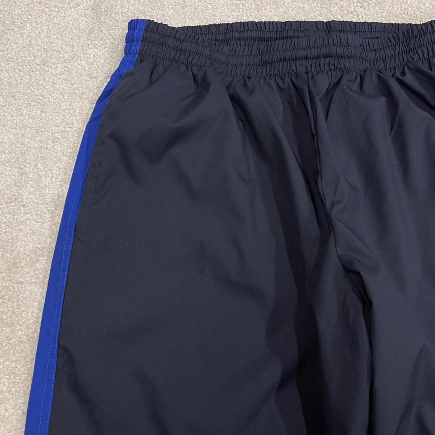 Y2K FILA tracksuit bottoms navy Loose embroidered lined side stripe track pants