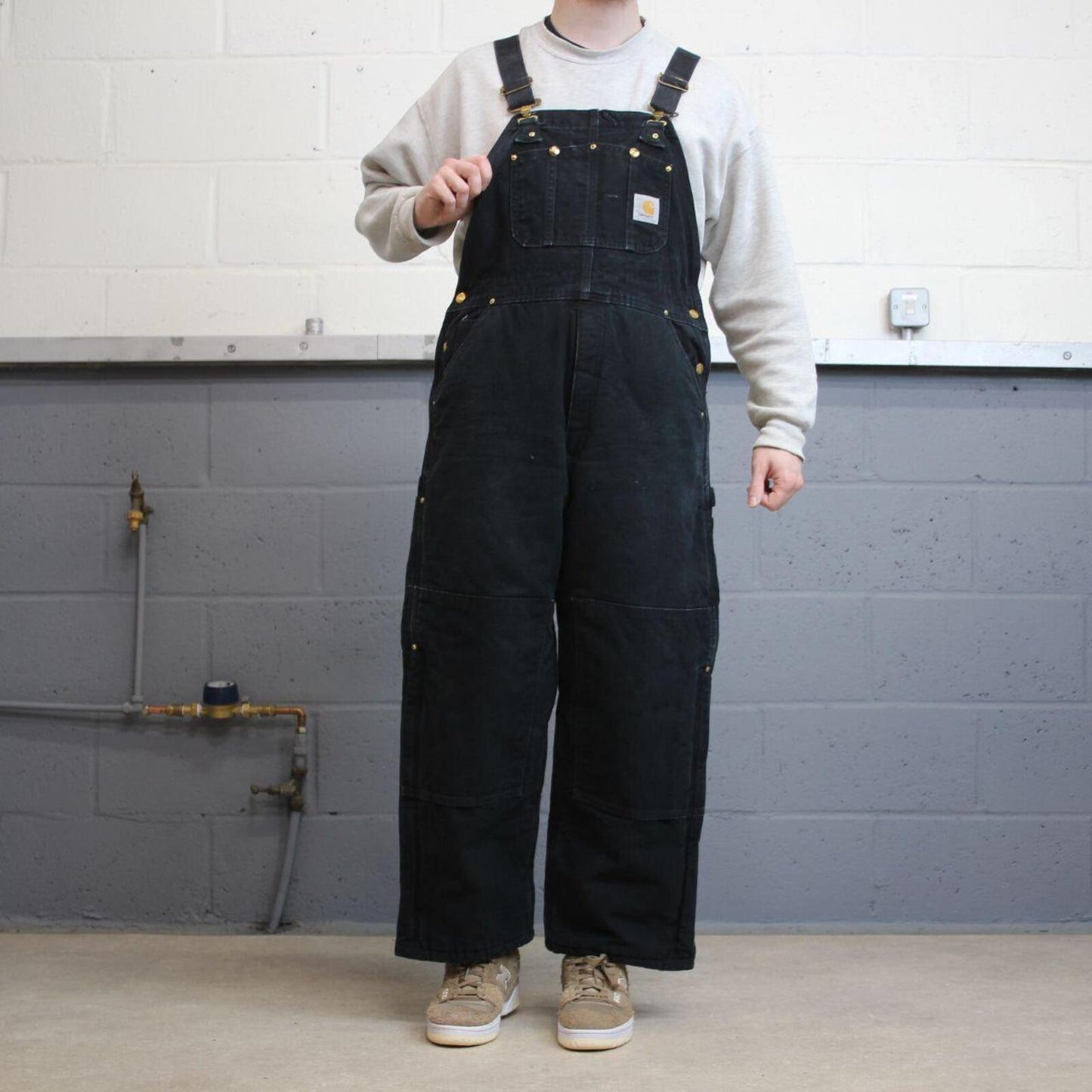 Vintage y2k Carhartt dungarees loose leg faded black Canvas quilt lined bib & brace overalls