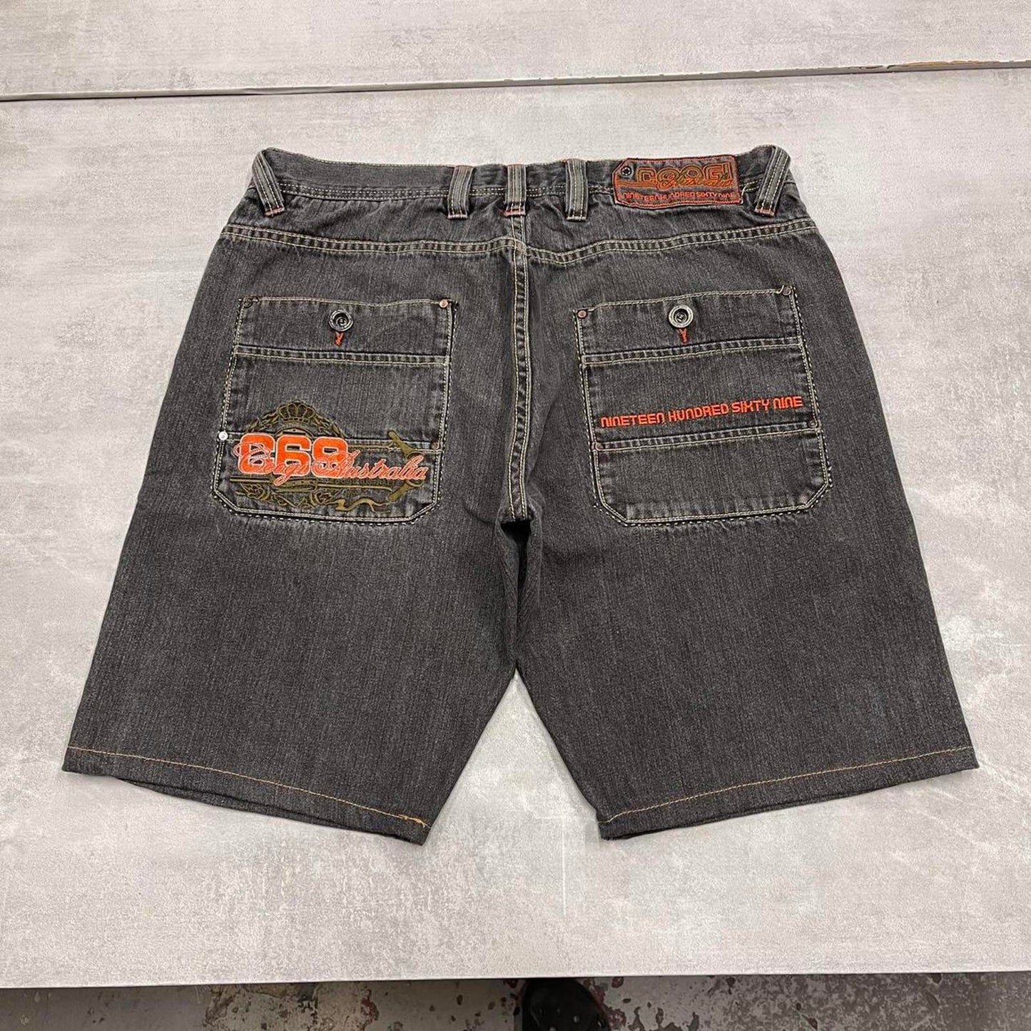 Embroidered black COOGI denim shorts W38