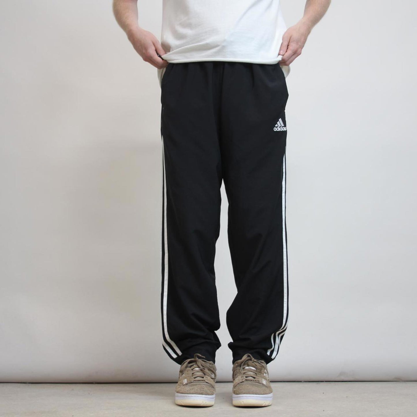 Adidas Trackies L black y2k track bottoms embroidered logo side stripe design