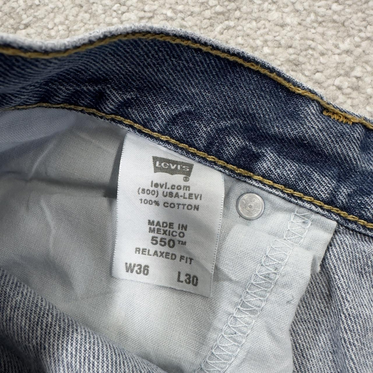 Levi’s 550 jeans Y2K blue relaxed denim Levi’s loose leg 2000s style pants red tab logo