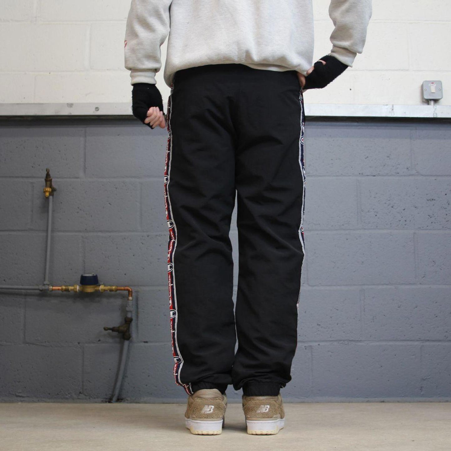 Vintage Champion tracksuit bottoms y2k style black joggers embroidered side stripe track pants
