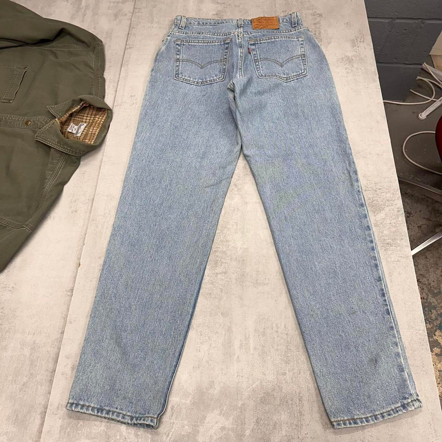 Blue Levi's 550 jeans size 12 (W30L33) relaxed fit taper leg denim jeans