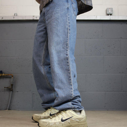 Levi’s 550 jeans Y2K blue relaxed denim Levi’s loose leg 2000s style pants red tab logo