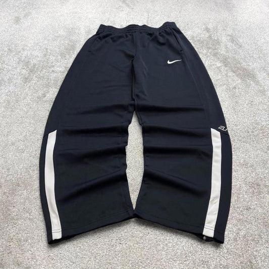 Black baggy Nike trackies Medium y2k style Dri-Fit joggers print Swoosh logo track pants
