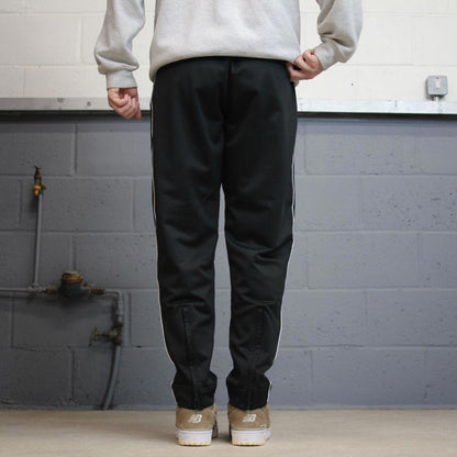 Black Nike trackies M 8-10 loose y2k floaty leg joggers embroidered logo