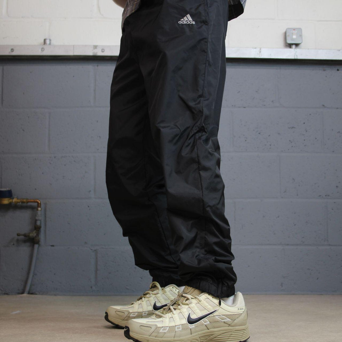Y2K Adidas tracksuit bottoms loose leg black S Loose lined embroidered logo casual track pants