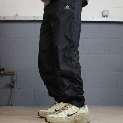 Y2K Adidas tracksuit bottoms loose leg black S Loose lined embroidered logo casual track pants