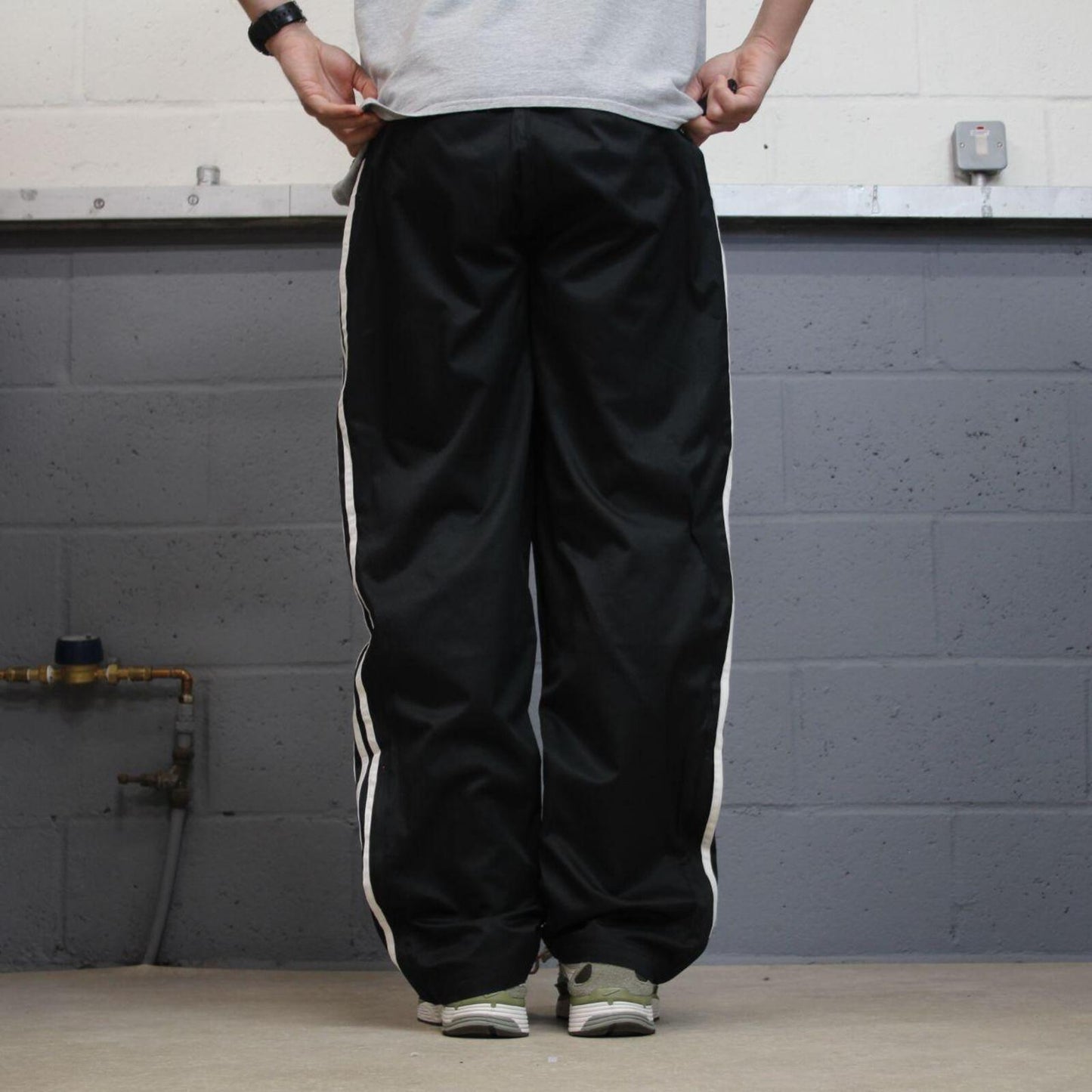 Adidas tracksuit bottoms loose black Loose floaty leg embroidered side stripe track pants