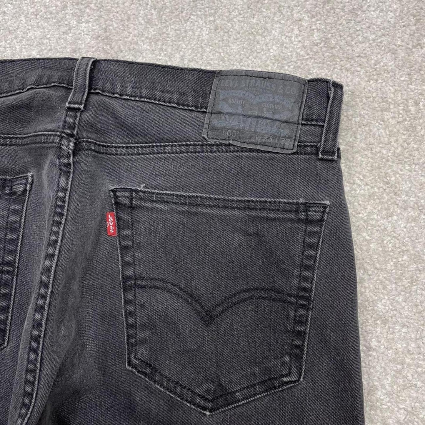 Y2k Levi's 505 jeans faded black Straight leg denim pants red tab logo
