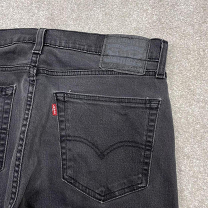 Y2k Levi's 505 jeans faded black Straight leg denim pants red tab logo