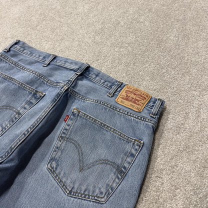 Levi’s 550 baggy jeans y2k W36L34 blue relaxed fit surf style pants red tab logo