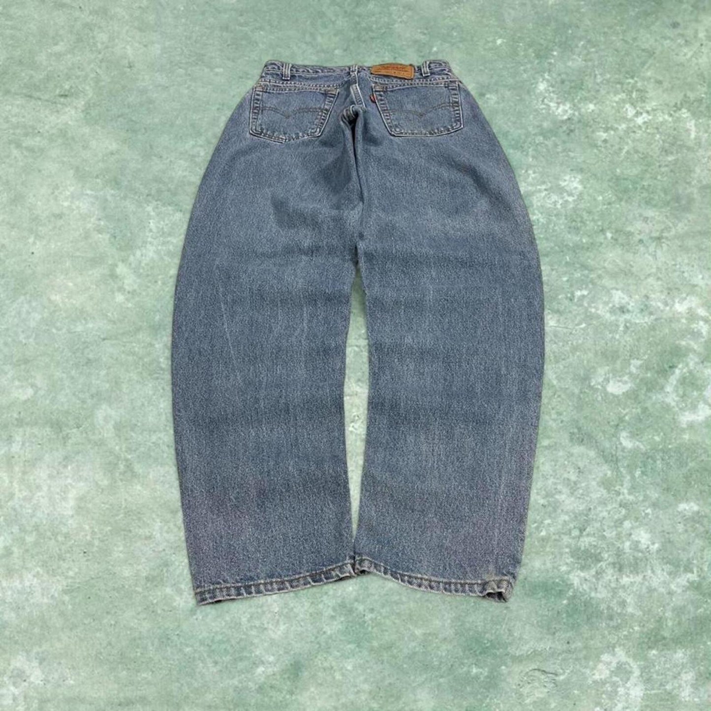 Vintage Levi's jeans 560 loose fit tapered leg blue USA made 100% cotton denim pants red tab logo