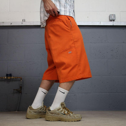 Orange baggy Dickies carpenter chino shorts Chino style skater shorts long wide leg festival