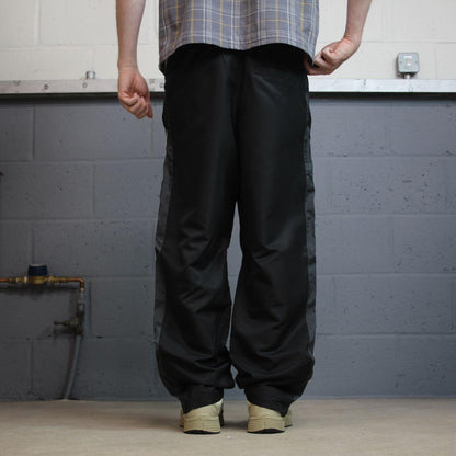 Y2K Starter tracksuit bottoms loose black Small mesh lined side stripe drawstring track pants