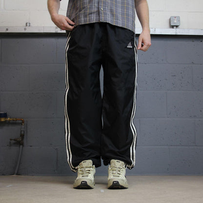 Vintage y2k Adidas tracksuit bottoms black Embroidered side stripe track pants