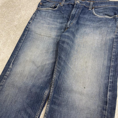 Y2K Levi’s 505 jeans straight leg faded blue Straight fit 5 pocket pants belt loops red tab logo