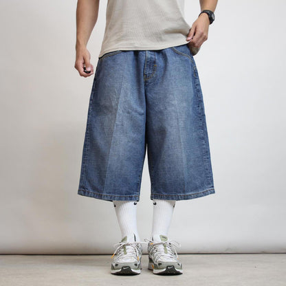 Baggy Rocawear skate jorts W40 long wide leg 90s style skater shorts embroidered design