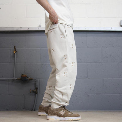 Y2k beige Nike joggers XL loose sweatpants cuffed legs embroidered logo