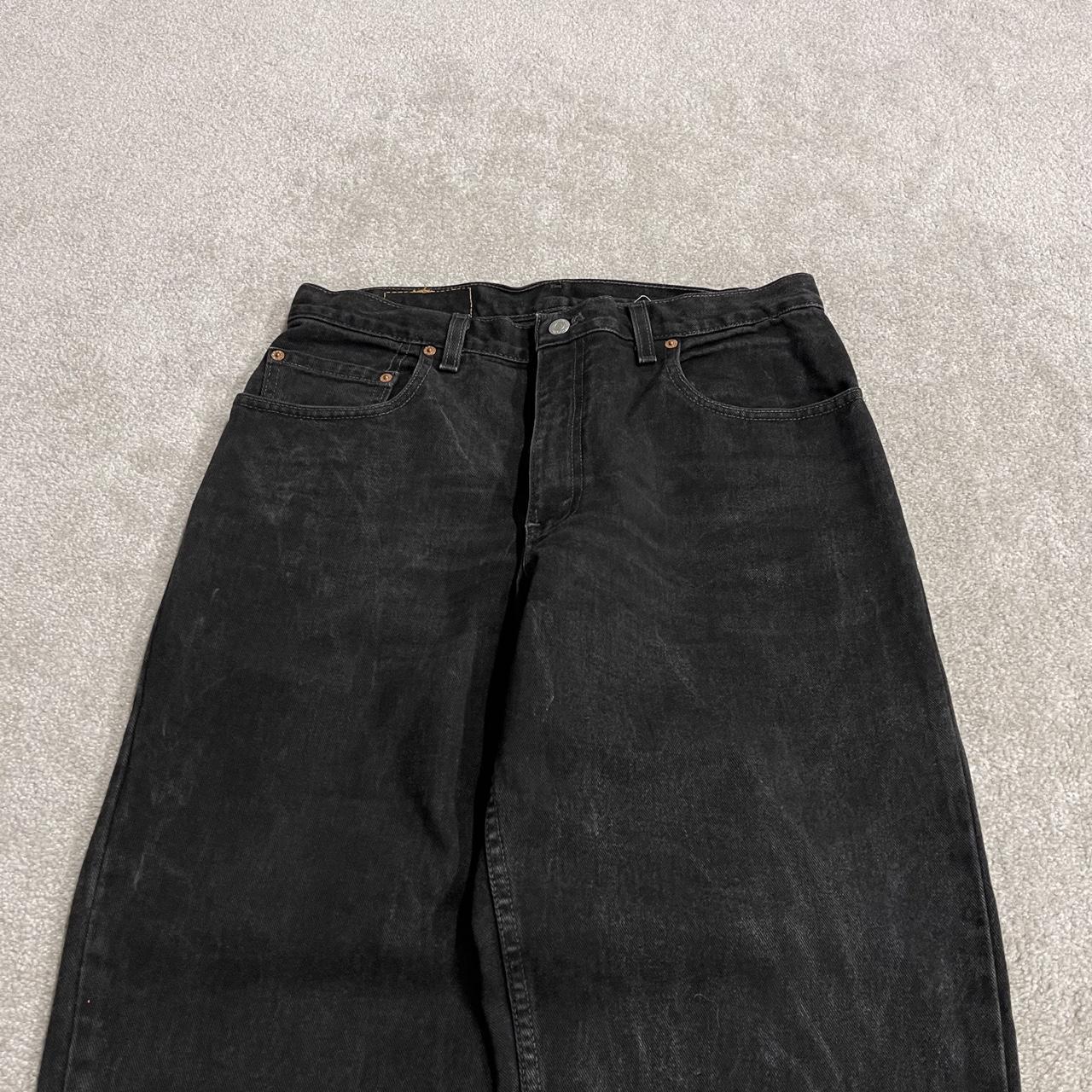 Vintage Levi's 560 jeans y2k black Loose fit denim pants red tab logo