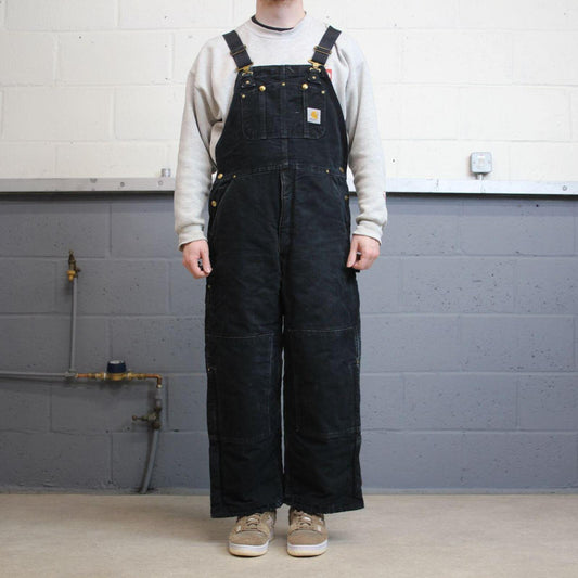 Vintage Carhartt dungarees wide leg faded black Canvas quilt lined bib & brace overalls