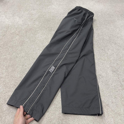 Vintage Nike baggy tracksuit bottoms Y2K grey Wide leg lined embroidered side stripe track pants