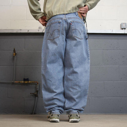 Y2K baggy Levi’s 560 jeans wide leg blue Loose comfort fit denim pants red tab logo
