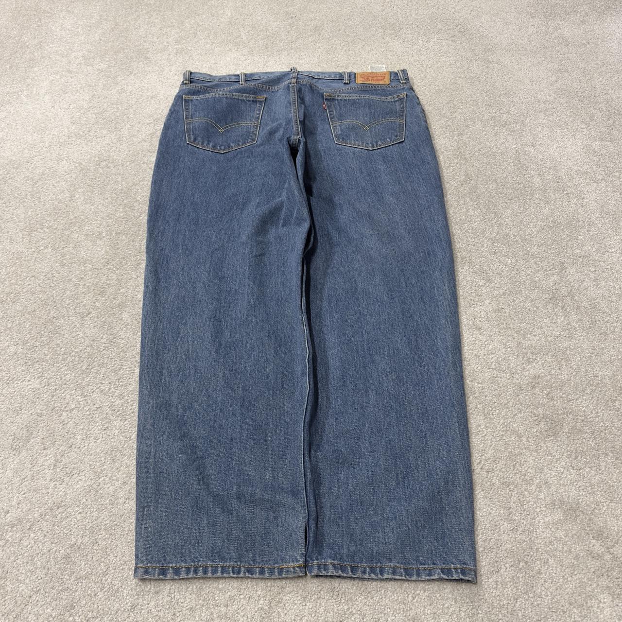 Baggy Levi’s 560 jeans y2k blue denim Levi’s wide leg skater 2000s style red tab logo pants