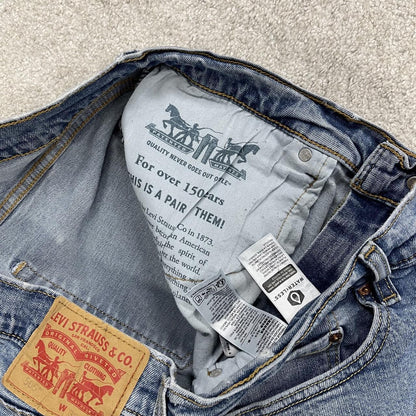Y2K Levi’s 505 jeans straight leg washed blue Straight fit 5 pocket pants red tab logo