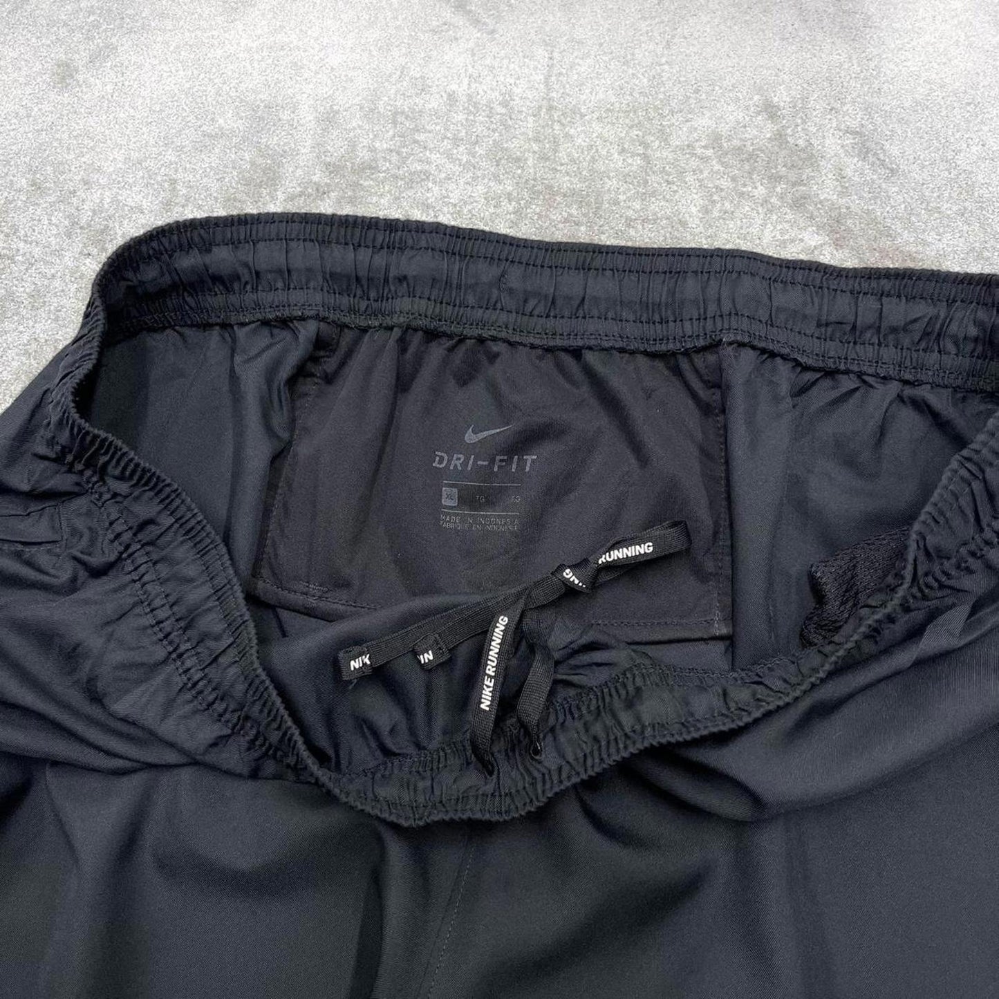 Vintage y2k Nike tracksuit bottoms black Floaty swoosh logo running track pants