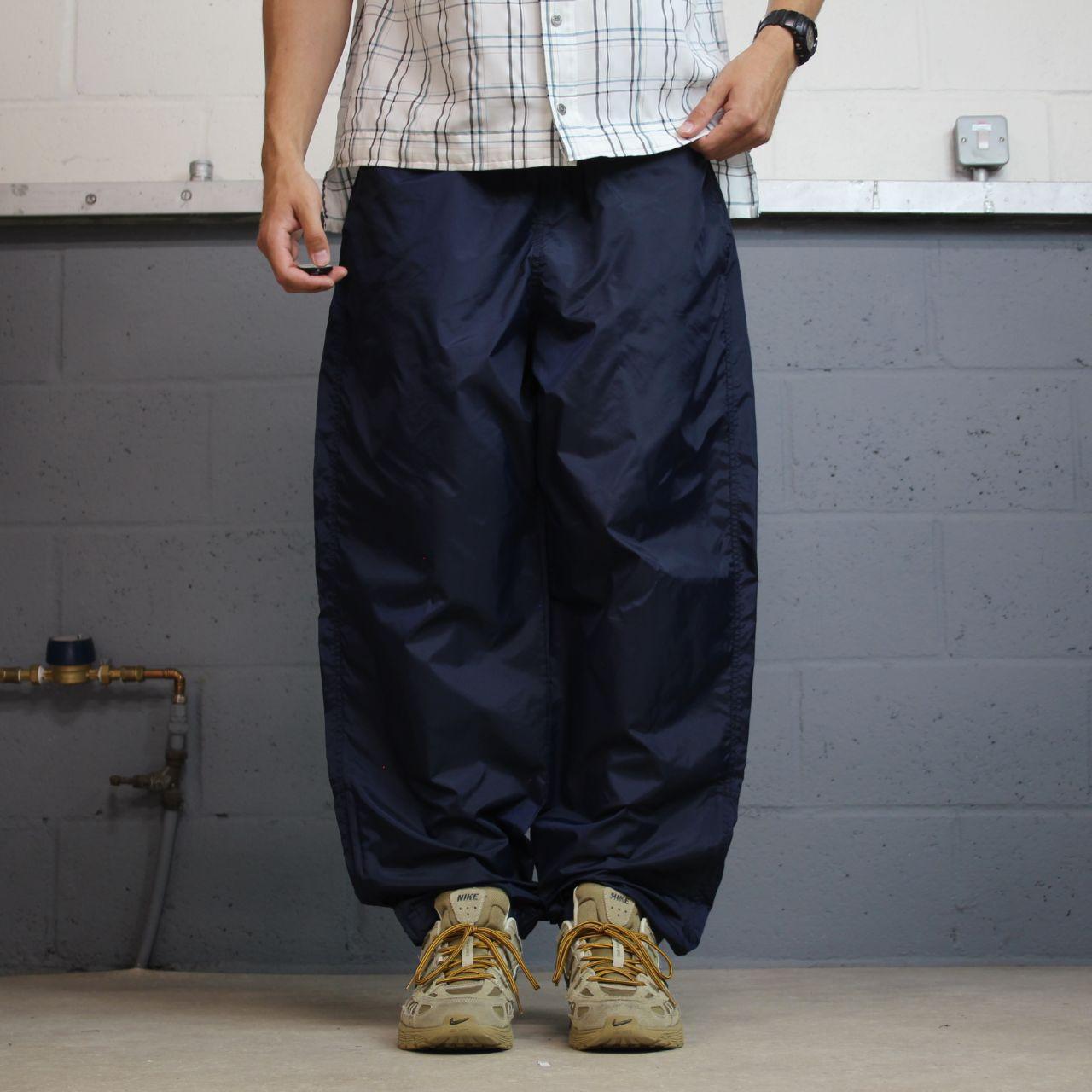 Vintage Nike tracksuit bottoms Y2K navy Loose leg unlined embroidered swoosh track pants