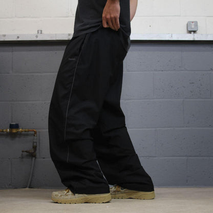 Reebok baggy tracksuit bottoms loose black Mesh lined embroidered drawstring track pants