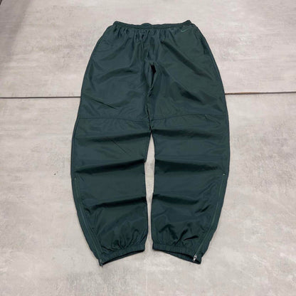 Green vintage Nike trackies Large loose y2k floaty leg joggers embroidered Swoosh logo shell suit