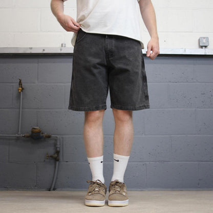 Black Wrangler carpenter jorts W31