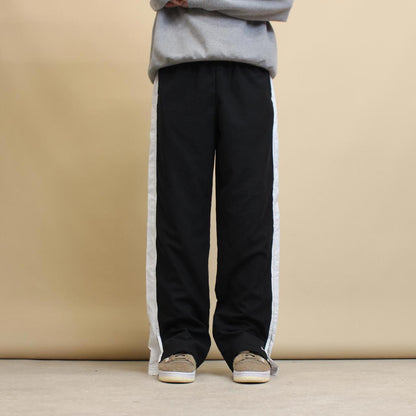 Black Nike tracksuit bottoms L loose y2k track pants embroidered logo