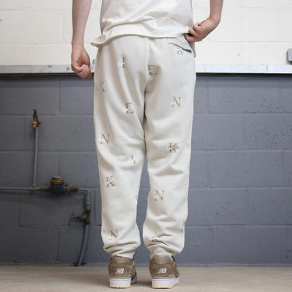 Y2k beige Nike joggers XL loose sweatpants cuffed legs embroidered logo