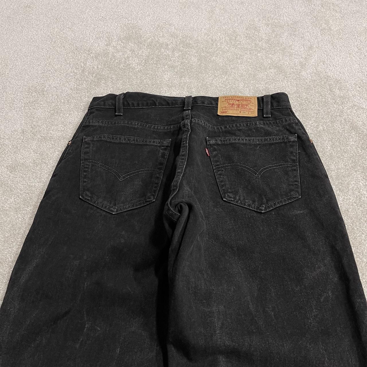 Vintage Levi's 560 jeans y2k black Loose fit denim pants red tab logo