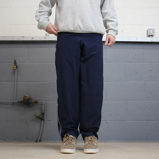 Nike Trackies S navy y2k 00s style dri-fit joggers print logo zip ankles