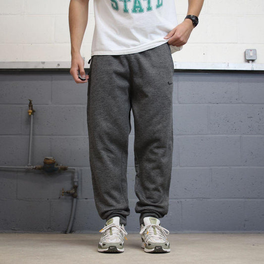 Nike Therma Fit Trackies Large Grey y2k 00s style loose leg joggers embroidered logo