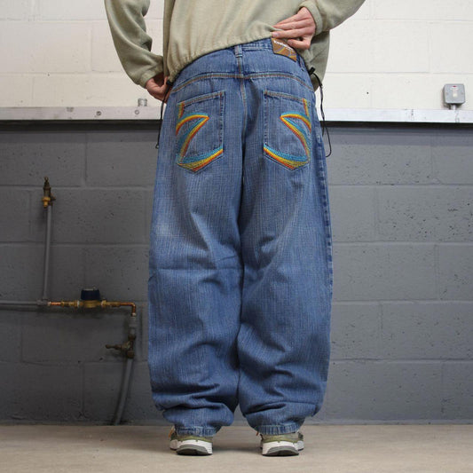 Y2K baggy embroidered jeans wide leg blue Evolution in Design loose fit denim skater style pants